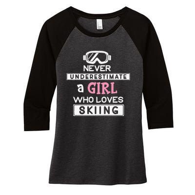 Skiing  Never Underestimate A Ski  Women's Tri-Blend 3/4-Sleeve Raglan Shirt