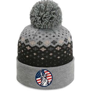 Statue Of Liberty With American Flag Fourth Of July The Baniff Cuffed Pom Beanie