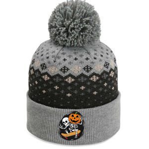 Skeleton On Skateboard With Jack O Lantern Head Funny Halloween Design The Baniff Cuffed Pom Beanie