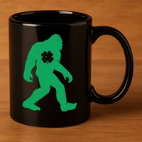 St Patricks Day Lucky Shamrock Clover Big Foot Sasquatch Yeti 11oz C Handle Ceramic Mug