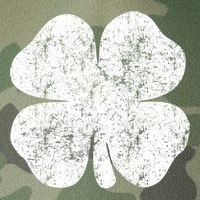 St. Patrick's Day Four Leaf Clover Green Background Design Legacy Tie Dye Trucker Hat