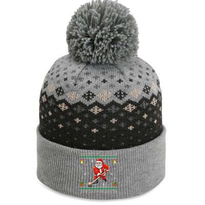 Santa Playing Hockey Sports Ugly Ice Hockey Christmas Funny Gift The Baniff Cuffed Pom Beanie