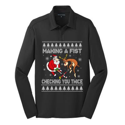 Santa Reindeer Making A Fist Checking You Twice Hockey Xmas Gift Silk Touch Performance Long Sleeve Polo