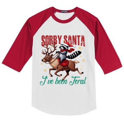 Sorry Santa IVe Been Feral Christmas Holiday Raccooon Riding Reindeer Kids Colorblock Raglan Jersey