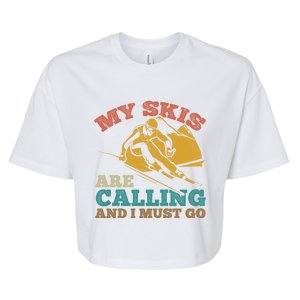 Ski Skier Skis My Skis Are Calling And I Must Go Skiing Gift Bella+Canvas Jersey Crop Tee