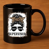 Shit Show Supervisor Women Casual Messy Bun Bleached 11oz C Handle Ceramic Mug