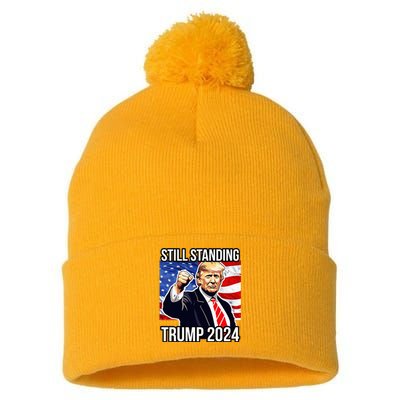 Still Standing Trump 2024 Rally Fist Pump Usa Donald Trump Pom Pom 12in Knit Beanie