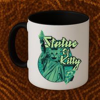 Statue Of Kitty Mug