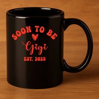 Soon To Be Gigi 2025 Mother's Day Promoted To New Grandma  11oz C Handle Ceramic Mug