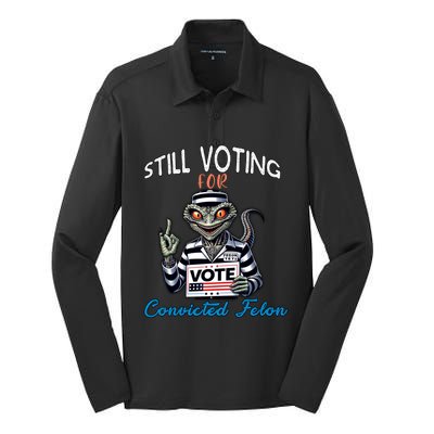 Still Voting For Convicted Felon Aliens Trump Reptilien Cool Gift Silk Touch Performance Long Sleeve Polo