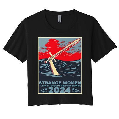 Strange Women Lying In Ponds Distributing Swords Women's Crop Top Tee