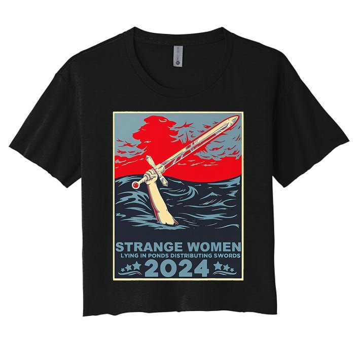 Strange Women Lying In Ponds Distributing Swords Women's Crop Top Tee