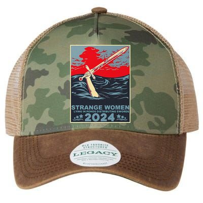 Strange Women Lying In Ponds Distributing Swords Design Legacy Tie Dye Trucker Hat