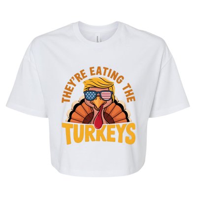 They Are Eating The Turkeys Funny Donald Trump Thanksgiving Bella+Canvas Jersey Crop Tee