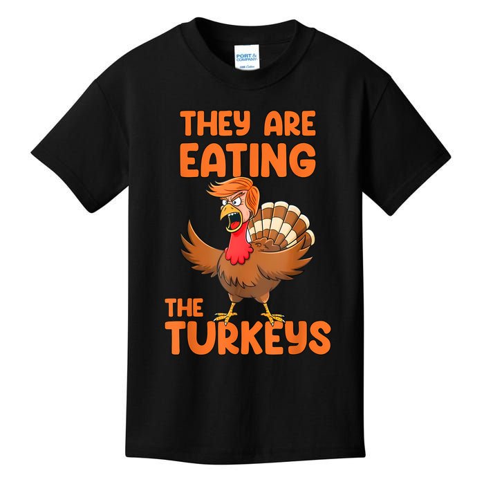 They Are Eating The Turkeys Funny Thankgiving Turkey Kids T-Shirt