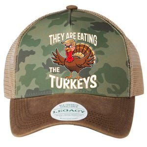 They Are Eating The Turkeys Thanksgiving Humor Legacy Tie Dye Trucker Hat