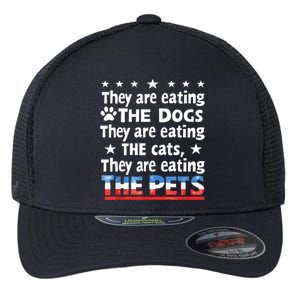 They Are Eating The Dogs The Cats The Pets Funny Trump Flexfit Unipanel Trucker Cap