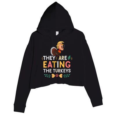 They Are Eating The Turkeys Funny Thankgiving Turkey Crop Fleece Hoodie