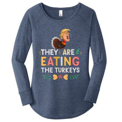 They Are Eating The Turkeys Funny Thankgiving Turkey Women's Perfect Tri Tunic Long Sleeve Shirt