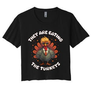 They Are Eating The Turkeys Funny Thankgiving Turkey Women's Crop Top Tee