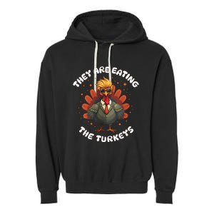 They Are Eating The Turkeys Funny Thankgiving Turkey Garment-Dyed Fleece Hoodie