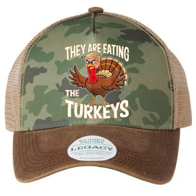 They Are Eating The Turkeys Funny Thanksgiving Legacy Tie Dye Trucker Hat