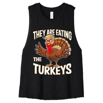 They Are Eating The Turkeys Funny Thanksgiving Women's Racerback Cropped Tank