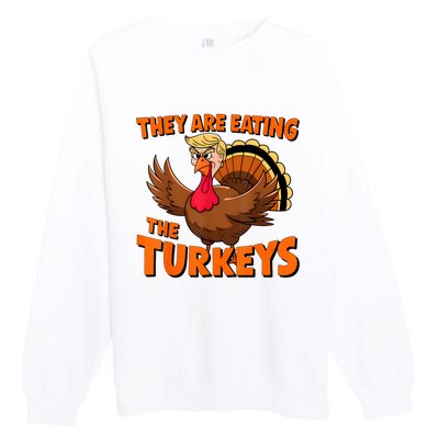 They Are Eating The Turkeys Funny Donald Trump Thanksgiving Premium Crewneck Sweatshirt