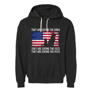 They Are Eating The Dogs The Cats The Pets Garment-Dyed Fleece Hoodie