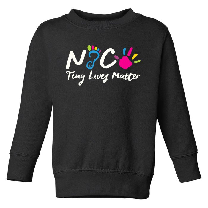 Taking Care Of Tiny Lives Neonatal NICU Nurse Gift TShirt Toddler Sweatshirt