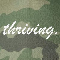 Thriving Cursive Script Dark Legacy Tie Dye Trucker Hat