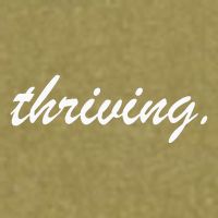Thriving Cursive Script Dark Garment-Dyed Women's Muscle Tee