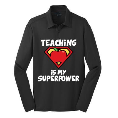 Teaching Is My Superpower Apple Crest Silk Touch Performance Long Sleeve Polo