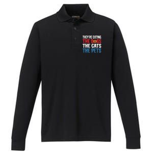 TheyRe Eating The Dogs The Cats The Pets Halloween Performance Long Sleeve Polo