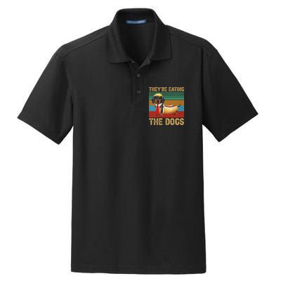 They’Re Eating The Dogs 2024 Retro Funny Dachshund Weiner Gift Dry Zone Grid Polo