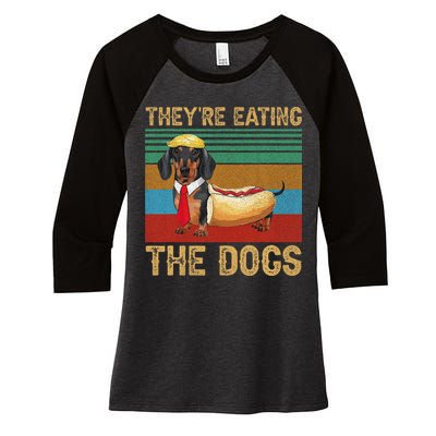 They’Re Eating The Dogs 2024 Retro Funny Dachshund Weiner Gift Women's Tri-Blend 3/4-Sleeve Raglan Shirt