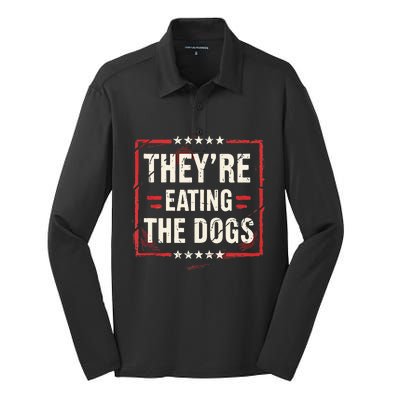 TheyRe Eating The Dogs Dog Lovers Humor Animal Pets Silk Touch Performance Long Sleeve Polo