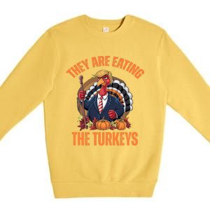 TheyRe Eating The Turkey Funny Trump Thanksgiving Humor Premium Crewneck Sweatshirt