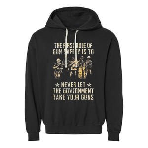 The First Rule Of Gun Safety (on back) Garment-Dyed Fleece Hoodie