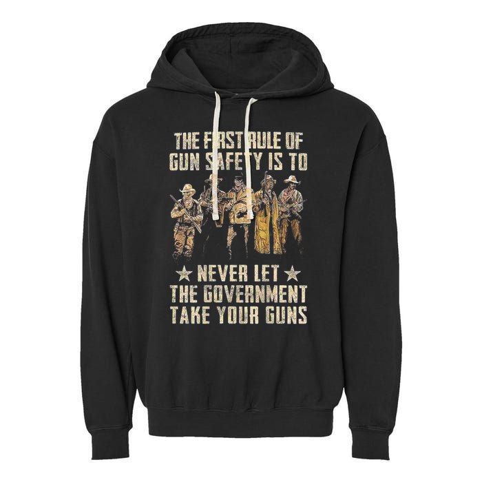 The First Rule Of Gun Safety (On Back) Garment-Dyed Fleece Hoodie
