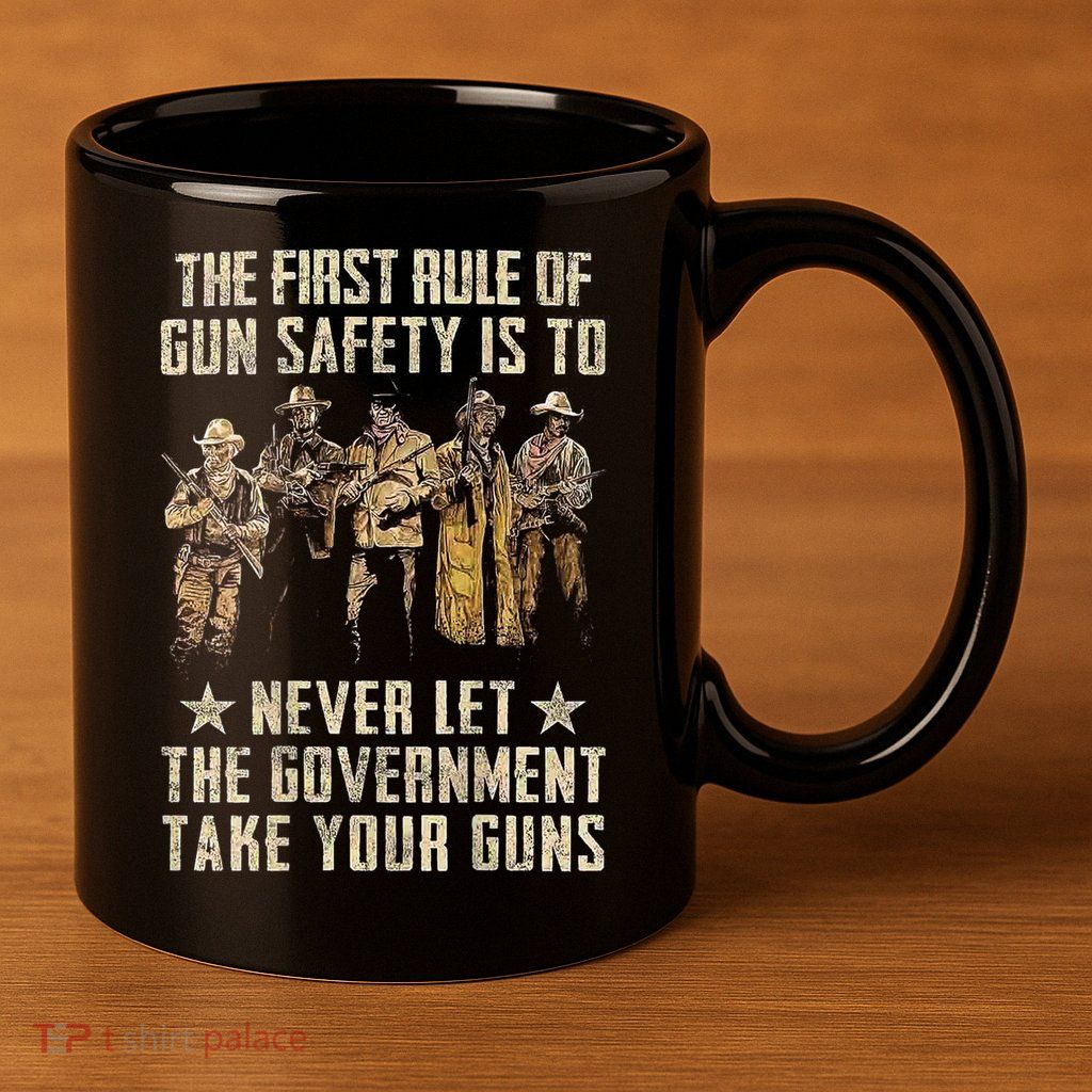 The First Rule Of Gun Safety (On Back) 11oz C Handle Ceramic Mug
