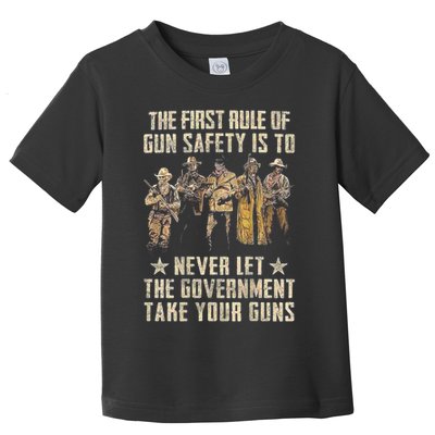 The First Rule Of Gun Safety (On Back) Toddler T-Shirt