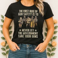 The First Rule Of Gun Safety (On Back) Womens T-Shirt