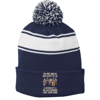 The First Rule Of Gun Safety (On Back) Stripe Pom Pom Beanie