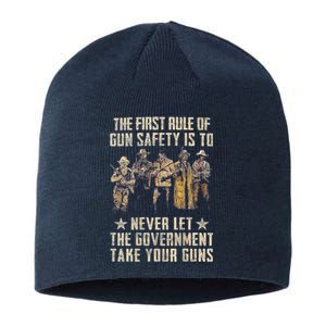 The First Rule Of Gun Safety (On Back) Sustainable Beanie