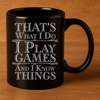 That's What I Do I Play Games And I Know Things 11oz C Handle Ceramic Mug