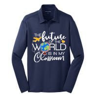 The Future of the World Is In My Classroom Silk Touch Performance Long Sleeve Polo