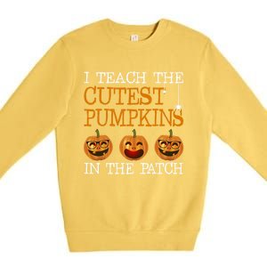 Teacher Halloween I Teach The Cutest Pumpkins In The Patch Cool Gift Premium Crewneck Sweatshirt