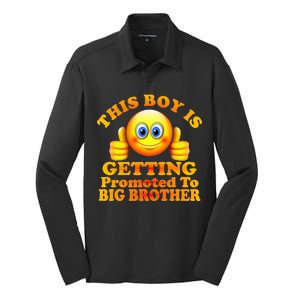 This Boy is Getting Promoted To Big Brother Smiley Emoji Silk Touch Performance Long Sleeve Polo