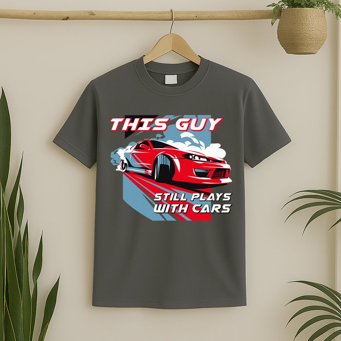 This Guy Still Plays With Cars T-Shirt